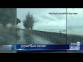 waves crash onto honoapiilani highway from high surf and high tides