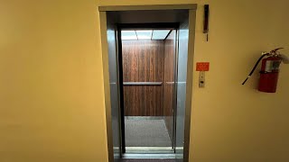 Pittsburgh, PA: Otis Black Button Hydraulic Elevator in an Apartment Building