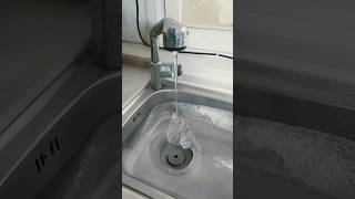 Icicles in the sink in the kitchen sink at home due to the frightening cold