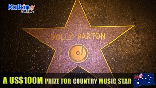 Why did philanthropist Dolly Parton receive a US$100M prize from Jezz Bezos?