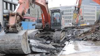 Excavator rails demolition in the middle zoom in