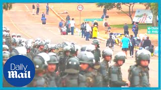 LIVE Brazil protests: Bolsonaro supporters camped outside military HQ