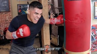 ADRIAN GRANADOS SHOWS YOU HOW A PRO BOXER HITS THE HEAVY BAG WITH POWERFUL COMBOS