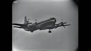 QANTAS plane flies over Windy Hill during Round 15 1963 VFL match.