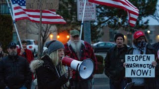 Tri-Citians protest outside state liquor agency office