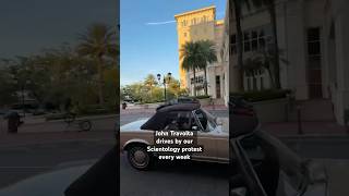 John Travolta visits Scientology protesters