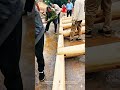 the process of assembling wooden structures by master carpenters