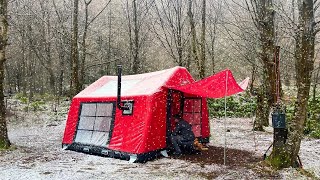 OUR TENT CAMP IN HEAVY RAIN AND SNOWY WEATHER