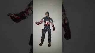 My custom painted damaged captain America figure with diroma...