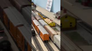 WAMX 4039 helping number 11 with a heavy freight train