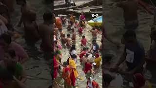 Hindus Take Holy Dip in the River Ganges #shorts  | VOA News
