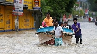 Over 100 feared dead as huge landslides bury Sri Lankan villages