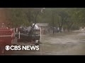 Heavy rain floods Dallas area, storm moves east