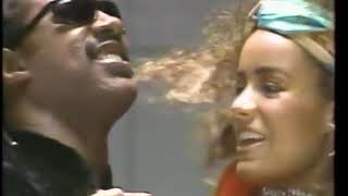 Galyn Görg dances with Stevie Wonder in a commercial