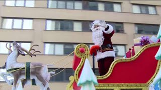 Despite a different route, parade-goers welcome Santa Claus