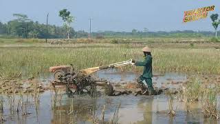 Tracktor plows a large rice field but is full of mud#VID0010