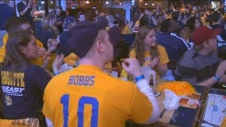 Marquette campus divided over basketball and Holy Thursday