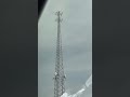 the tall grey lattice cell phone tower in belvedere south carolina at day