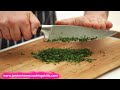 chopping a bunch of fresh herbs jamie oliver s home cooking skills