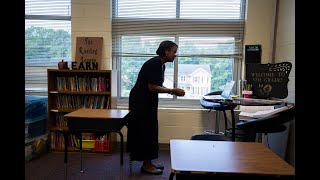 Inside classrooms teachers welcome students back to school through their computer screens