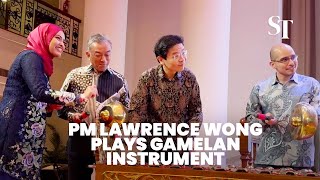 PM Lawrence Wong plays gamelan instrument at charity event