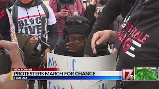 Hundreds march in Graham seeking criminal justice reform