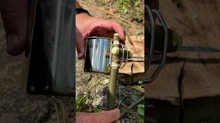 Survival Skills: How to Secure a Mug Over a Fire in Extreme Conditions. #survival #camping