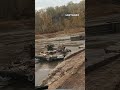 russian tank destroyed by ukrainian soldiers on a pontoon crossing warinukraine tanks russia