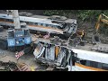 Taiwan salvage teams extract mangled carriage from train crash tunnel | AFP