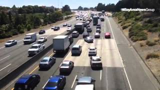 Traffic slows on westbound I-80 as crews clean up an accident involving a big rig in Pinole Californ