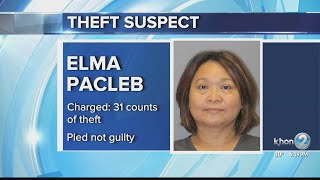 Travel agent pleads not guilty to dozens of theft charges