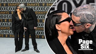Kourtney Kardashian and Travis Barker make out in matching black suits on the Emmys 2024 red carpet
