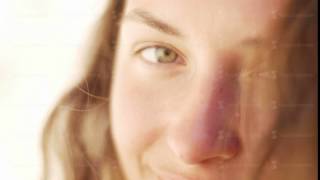 close up of happy smiling beautiful young woman eyes and hair