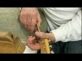 How to Fix a Ringing Guitar String : Guitar Building & Repair