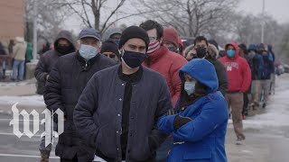 Texans line up for hours in search of food and water