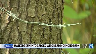 Walkers irked by barbed wire on trail north of Grand Rapids park