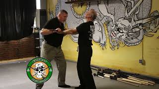 Breaking the Wrist Bones with the Shillelagh in a Double Lapel Grab - Irish Stick Fighting