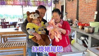 婆婆上来找妈妈去看日子，准备年底进新房，叔叔买了一大捆猪尾巴