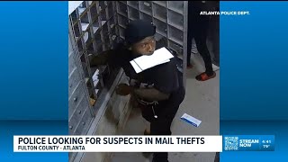 Suspects caught on camera stealing mail
