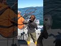 big coho in the net alaska salmon fishing juneau shorts