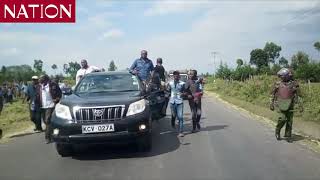 MP Johana Ngeno escorted by police and supporters to his home