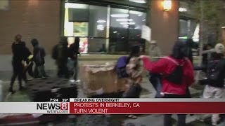 Berkeley protesters smash windows; 2 officers hurt