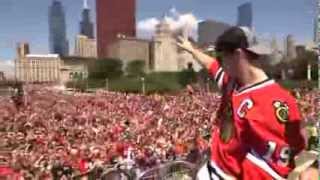 Toews hoists Cup during 2013 parade