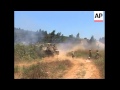 Shelling on a Lebanese village from across the Israeli border