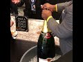 opening a nebuchadnezzar of taittinger champagne