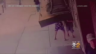Caught On Camera: Awning Collapses On Two Women