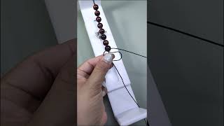 How to tie knots to separate beads when making bracelets. #braceletmaking #diy #diyjewelry