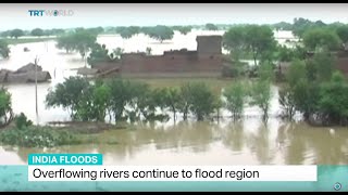 Overflowing rivers continue to flood northeastern India