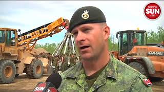 Canadian Forces members help with sandbagging efforts