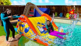 Emma and Ellie Pretend Play Going Swimming in the Pool with Giant Inflatable Slide